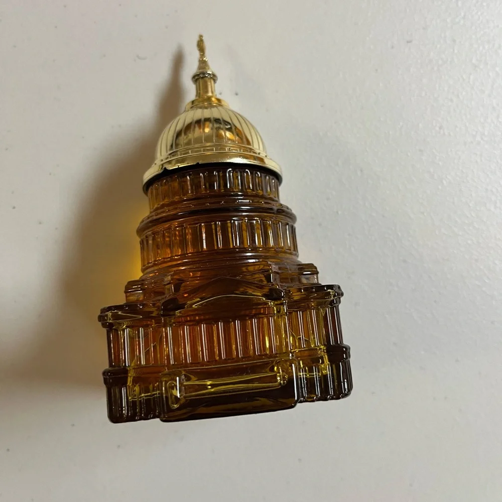 Vintage Avon Capitol Building Amber and Gold Cologne Bottle